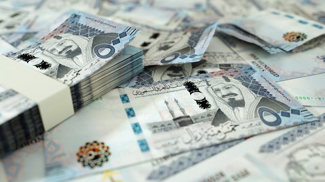 Close,Up,Of,Saudi,Riyal,Notes,Spread,On,Table