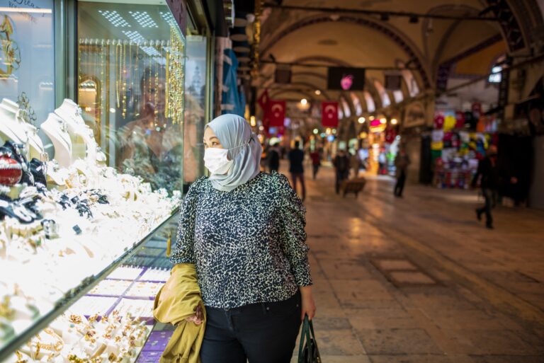 Muslim woman with a mask in the bazaar in Turkey during Covid-19 pandemic